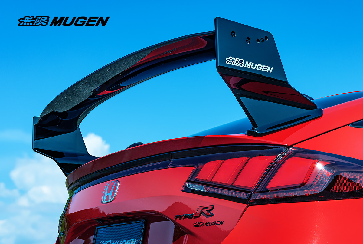 Side profile of the Mugen Group A Rear Wing on a Honda Civic Type R FL5, showing the aggressive outward skew of the wing plates